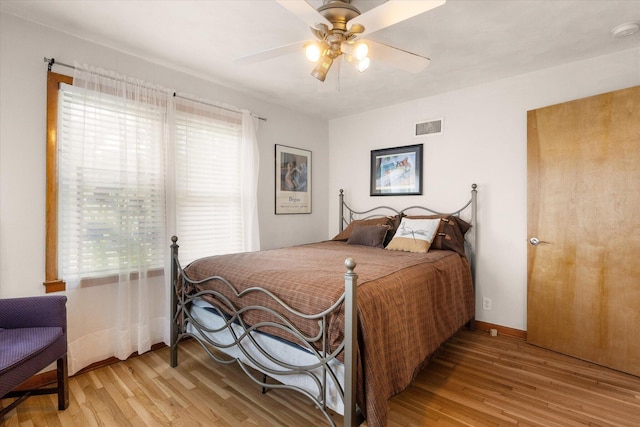 201 Ruby Ln, Columbia, MO 65203 - bedroom featuring wood finished floors and ceiling fan