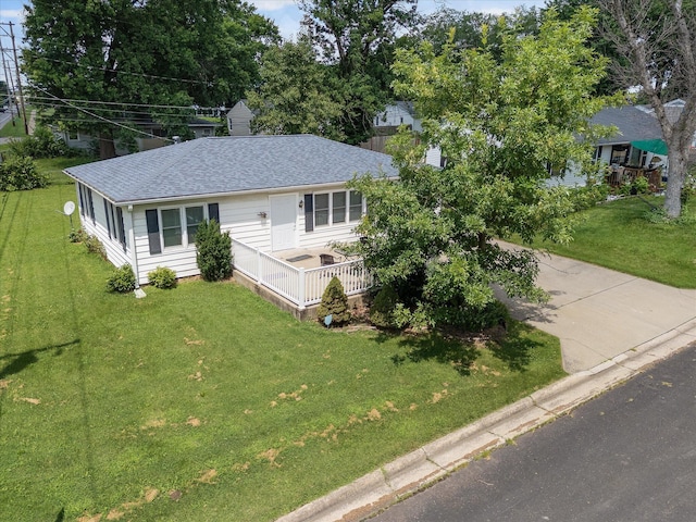 201 Ruby Ln, Columbia, MO 65203 - single story home with roof with shingles, a front yard, and a deck