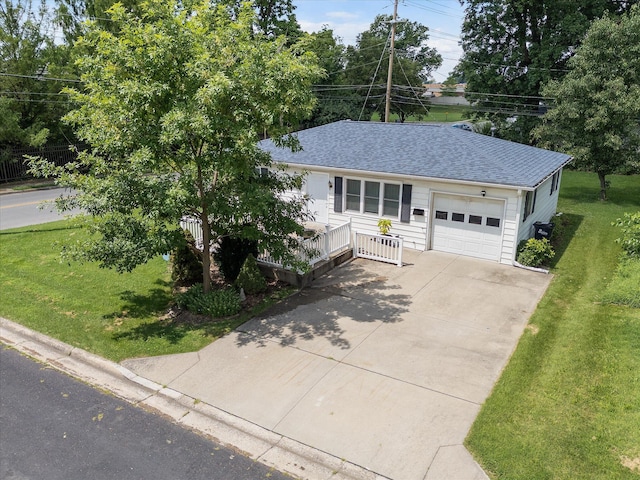 201 Ruby Ln, Columbia, MO 65203 - single story home with an attached garage, a front lawn, concrete driveway, roof with shingles, and a porch