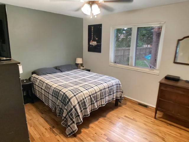 113 E El Cortez Dr, Columbia, MO 65203 - bedroom featuring wood finished floors and ceiling fan