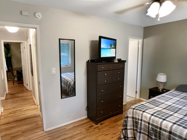 113 E El Cortez Dr, Columbia, MO 65203 - bedroom with light wood-style floors and a ceiling fan