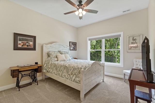 1880 W Cresskill Dr, Columbia, MO 65203 - bedroom with light colored carpet and a ceiling fan