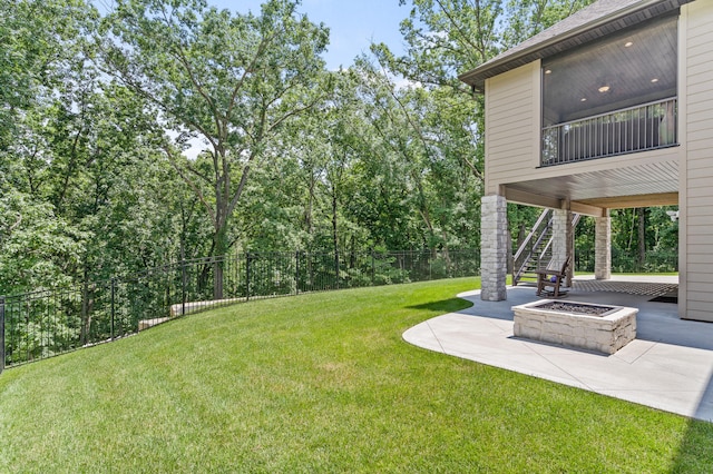 1880 W Cresskill Dr, Columbia, MO 65203 - view of yard with stairway, a patio area, and an outdoor fire pit