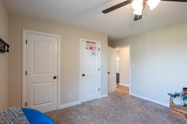717 S Central St, Centralia, MO 65240 - unfurnished bedroom with light carpet and ceiling fan