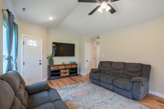 717 S Central St, Centralia, MO 65240 - living area with wood finished floors, lofted ceiling, and ceiling fan