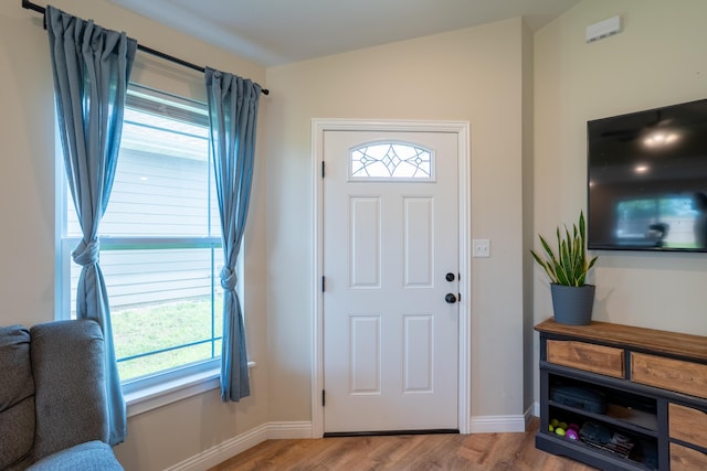 717 S Central St, Centralia, MO 65240 - entrance foyer featuring wood finished floors and baseboards