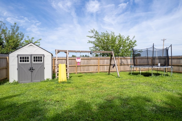 717 S Central St, Centralia, MO 65240 - fenced backyard with a storage shed and a trampoline