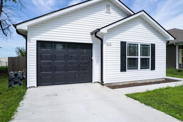 717 S Central St, Centralia, MO 65240 - view of front of house featuring driveway and an attached garage