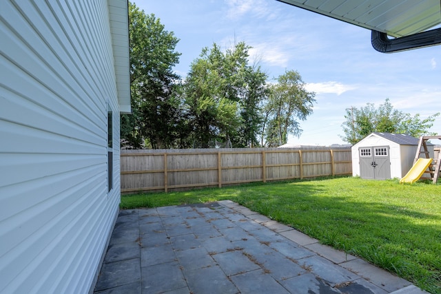 717 S Central St, Centralia, MO 65240 - fenced backyard with a patio area and a shed