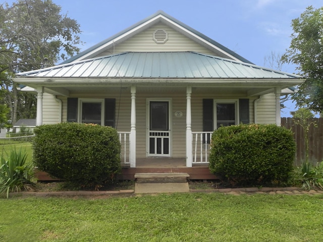 205 W Harrison St, Farber, MO 63345 - view of front of house featuring a porch, a metal roof, and a standing seam roof