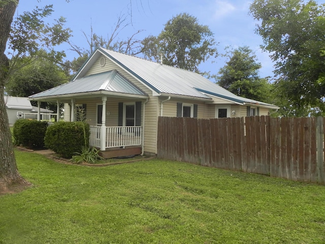 205 W Harrison St, Farber, MO 63345 - view of property exterior with covered porch and a metal roof