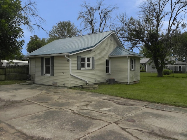 205 W Harrison St, Farber, MO 63345 - rear view of property featuring a patio and a metal roof