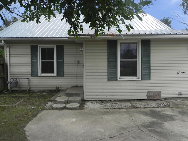 205 W Harrison St, Farber, MO 63345 - view of front of house with a patio area and a metal roof