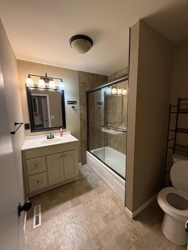 2220 N Lakeland Dr, Columbia, MO 65202 - bathroom featuring enclosed tub / shower combo and vanity