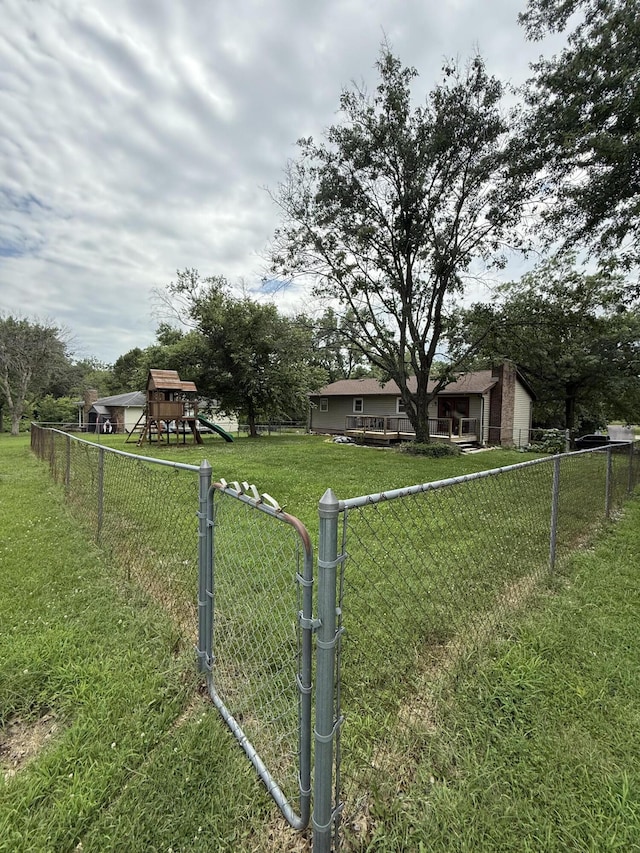 2220 N Lakeland Dr, Columbia, MO 65202 - view of yard featuring a playground and a gate