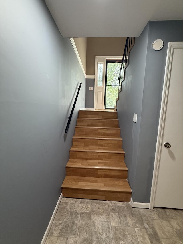 2220 N Lakeland Dr, Columbia, MO 65202 - stairway featuring baseboards and stone finish floors