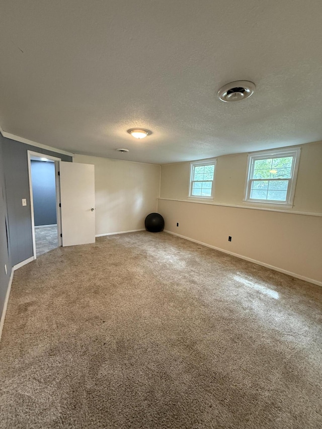 2220 N Lakeland Dr, Columbia, MO 65202 - empty room with a textured ceiling and carpet