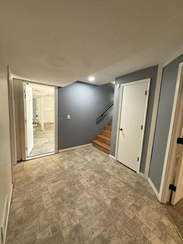 2220 N Lakeland Dr, Columbia, MO 65202 - finished basement featuring stairway and baseboard heating