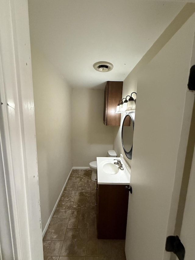 2220 N Lakeland Dr, Columbia, MO 65202 - half bathroom featuring vanity and baseboards