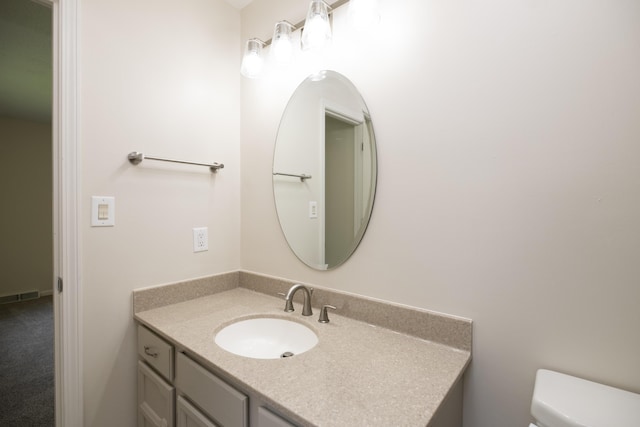 6303 S Old Village Rd, Columbia, MO 65203 - half bathroom with vanity and toilet