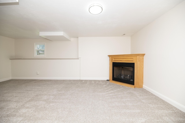 6303 S Old Village Rd, Columbia, MO 65203 - unfurnished living room with carpet floors and a fireplace