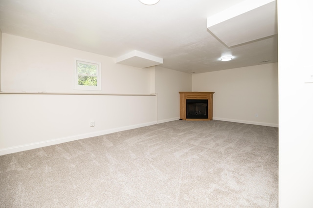 6303 S Old Village Rd, Columbia, MO 65203 - below grade area with carpet and a fireplace