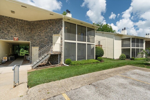 706 Park Deville Pl, Columbia, MO 65203 - view of building exterior featuring uncovered parking