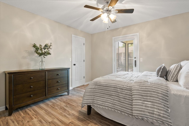 706 Park Deville Pl, Columbia, MO 65203 - bedroom with light wood-style floors and a ceiling fan