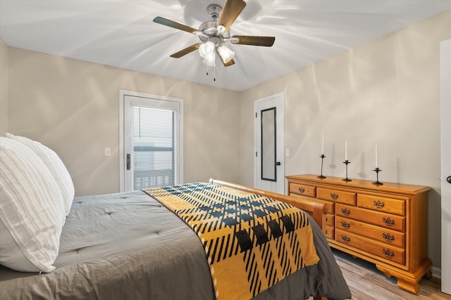 706 Park Deville Pl, Columbia, MO 65203 - bedroom featuring light wood-style flooring and a ceiling fan