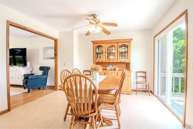 11657 Fletcher Ln, Holts Summit, MO 65043 - dining room featuring light colored carpet and ceiling fan