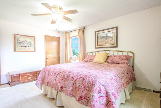 11657 Fletcher Ln, Holts Summit, MO 65043 - carpeted bedroom featuring ceiling fan and baseboards