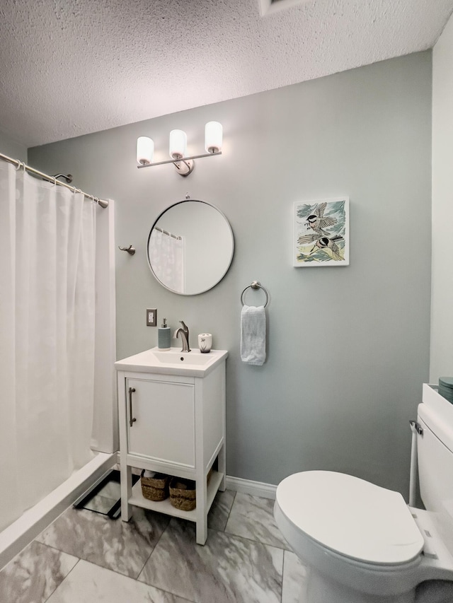 11657 Fletcher Ln, Holts Summit, MO 65043 - full bath with marble finish floors, vanity, curtained shower, and a textured ceiling