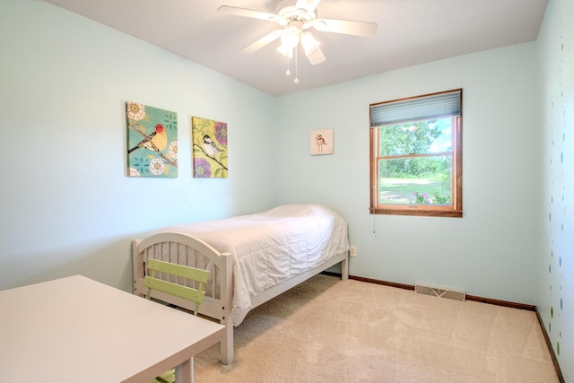 11657 Fletcher Ln, Holts Summit, MO 65043 - carpeted bedroom with baseboards and ceiling fan