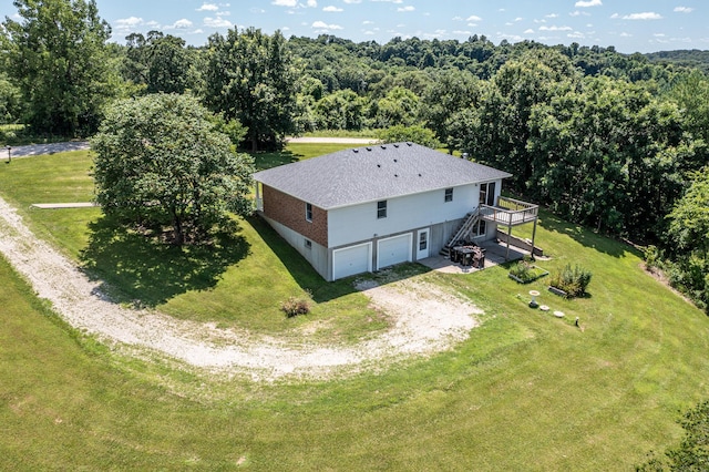 11657 Fletcher Ln, Holts Summit, MO 65043 - view from above of property featuring a heavily wooded area