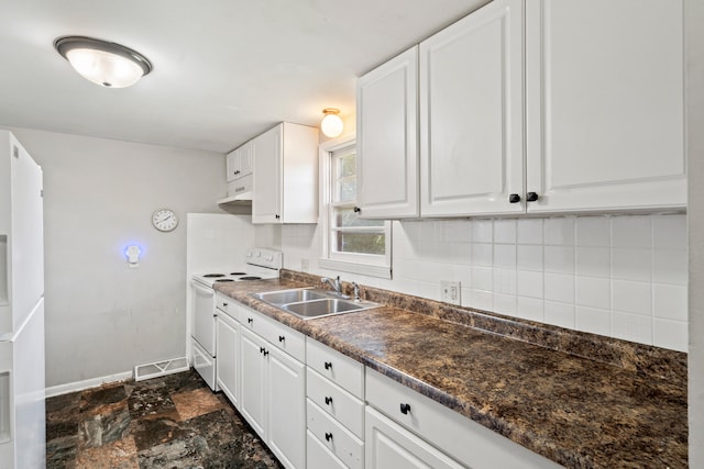 5704 N Teresa Dr, Columbia, MO 65202 - kitchen featuring white appliances, dark stone finish floors, backsplash, and dark countertops