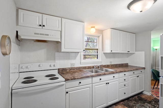 5704 N Teresa Dr, Columbia, MO 65202 - kitchen with electric stove, under cabinet range hood, dark countertops, and white cabinets