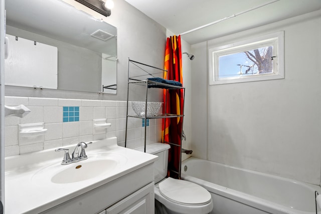 5704 N Teresa Dr, Columbia, MO 65202 - bathroom with bathing tub / shower combination, vanity, and tile walls
