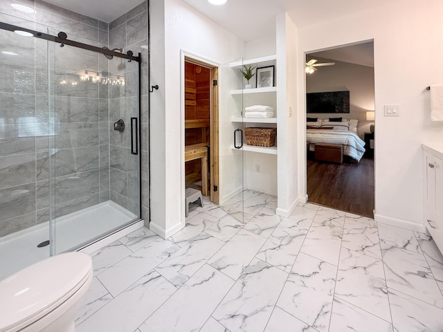 3712 Godfrey Dr, Columbia, MO 65203 - ensuite bathroom featuring a ceiling fan, a stall shower, and marble look tiles