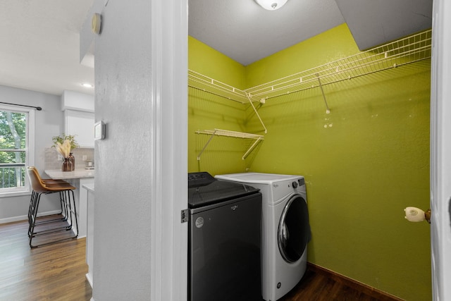 3712 Godfrey Dr, Columbia, MO 65203 - laundry room with washer and dryer and wood finished floors