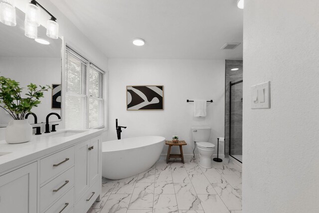 3712 Godfrey Dr, Columbia, MO 65203 - bathroom featuring a shower stall, double vanity, a soaking tub, and marble finish flooring