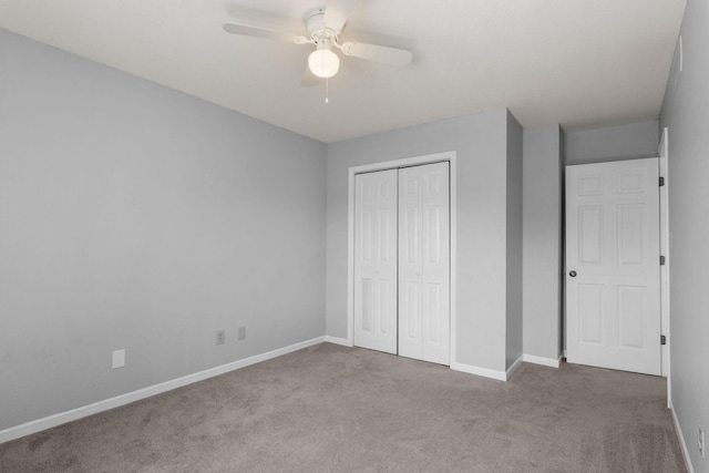 3712 Godfrey Dr, Columbia, MO 65203 - unfurnished bedroom featuring carpet, a closet, and ceiling fan