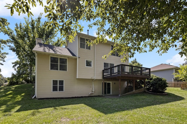 3712 Godfrey Dr, Columbia, MO 65203 - rear view of house with a yard, a deck, and a chimney