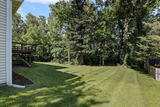 3712 Godfrey Dr, Columbia, MO 65203 - view of grassy yard with a wooden deck