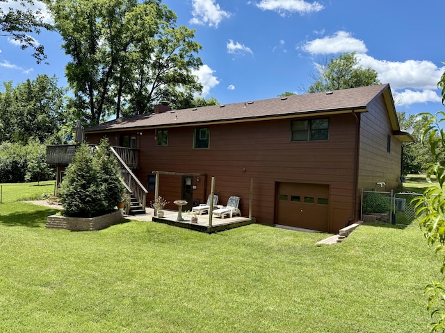 1620 S Berkley Dr, Columbia, MO 65201 - back of house featuring an attached garage, a deck, stairs, and driveway