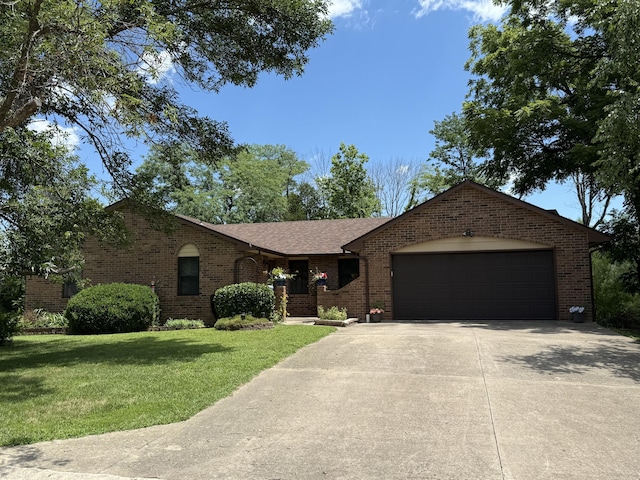 1620 S Berkley Dr, Columbia, MO 65201 - ranch-style house with concrete driveway, brick siding, an attached garage, and a front lawn