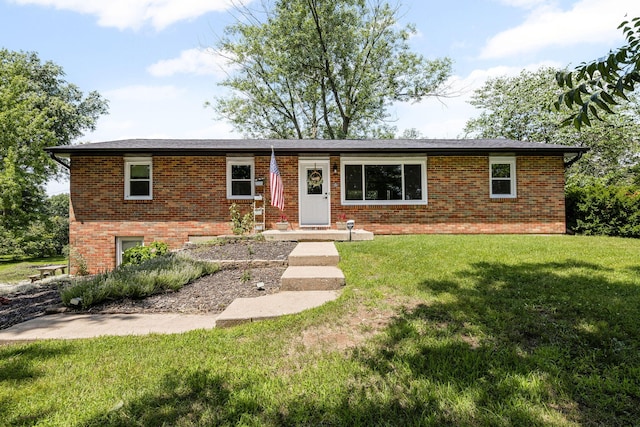 661 N W Park Ln, Columbia, MO 65201 - view of front of home featuring brick siding and a front yard