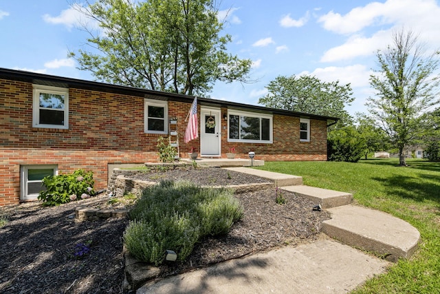 661 N W Park Ln, Columbia, MO 65201 - view of front of house featuring brick siding and a front yard
