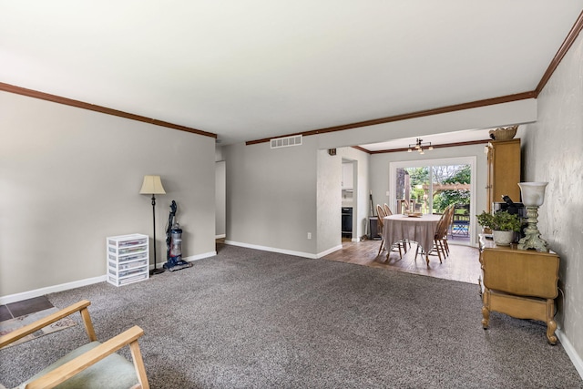 661 N W Park Ln, Columbia, MO 65201 - carpeted living room featuring ornamental molding and baseboards