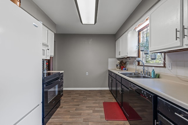 661 N W Park Ln, Columbia, MO 65201 - kitchen with black appliances, white cabinetry, and tasteful backsplash
