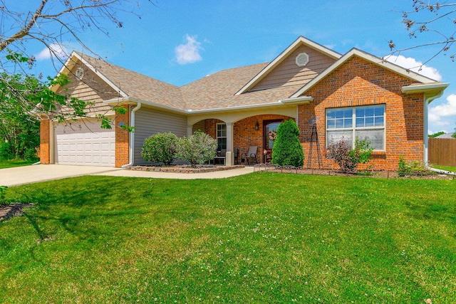 5805 Vero Way, Columbia, MO 65201 - view of front of house with brick siding, a garage, driveway, and a shingled roof
